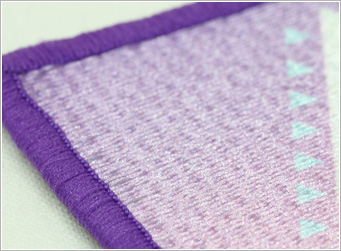 当店が採用しているワッペンの生地は、表面が糸で織られている高品質厚手クロス生地